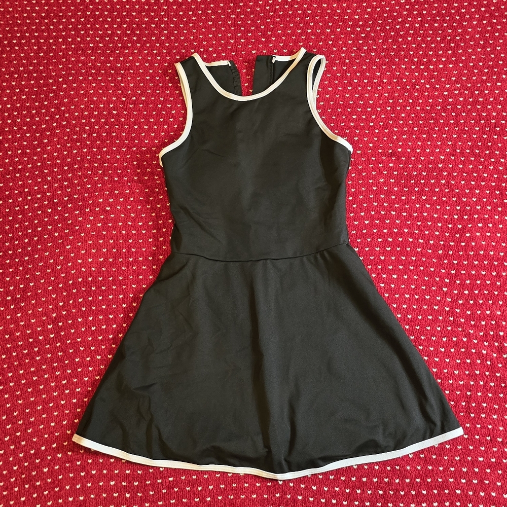 Black Sleeveless Dress with White Trim